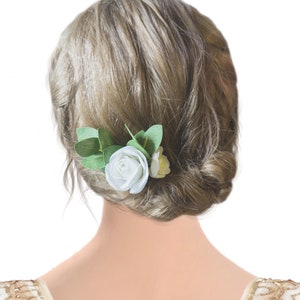 White rose hair piece for bride with eucalyptus leaves and hygrangea