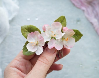 Postiches floraux de mariage avec peigne fleur de mariée rose poudré