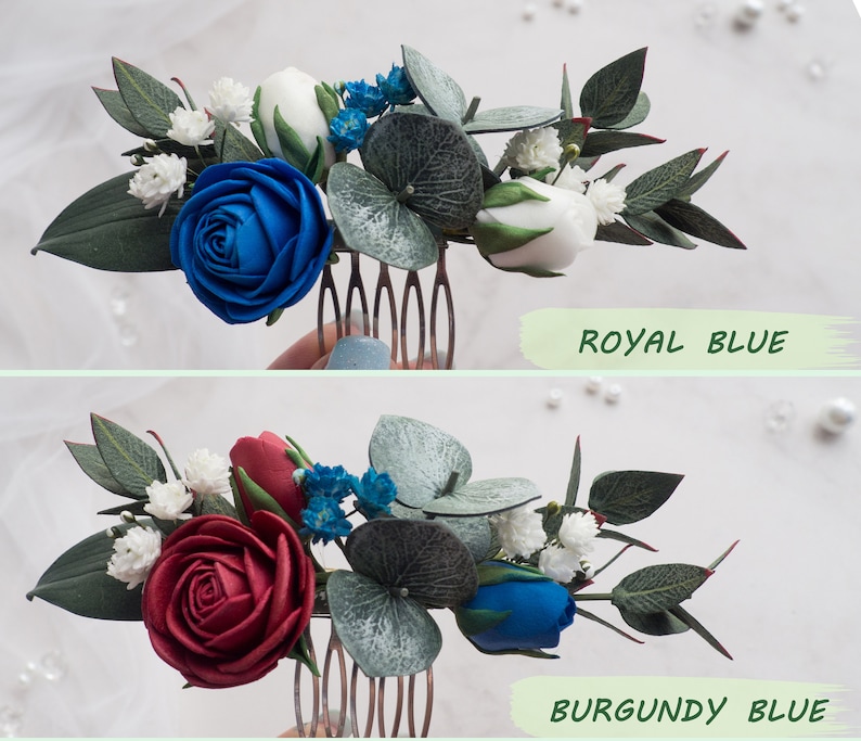 May include: Floral hair comb featuring a royal blue rose, white buds, and small blue flowers, accented with green leaves. The text "ROYAL BLUE" is displayed below the comb. A second comb with a burgundy rose is also shown, with the text "BURGUNDY BLUE".