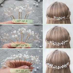 May include: A set of hair pins featuring gold-toned wire branches adorned with small white faux pearls and tiny white floral accents. The collection is displayed in sets of three, five, and seven, shown both individually and styled in hair.