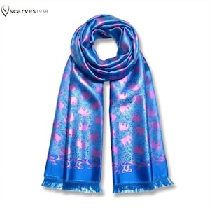 Vibrant blue and magenta contrast elephants silk scarf shawl Repeating pink elephant motif Lightweight and breathable drape Elegant women's