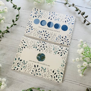 Ensemble de 2 cartes cosmiques - Vers la lune et retour - Vous voulez dire le monde - Phases de la Lune et botaniques - Amitié - Amour - Anniversaire
