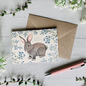 Hoppy Easter Card - Bunny Rabbit and Blue Flowers Illustrated Watercolour Greeting Card