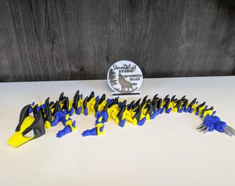 Articulated 3D printed Wolverine-Dragon toy.