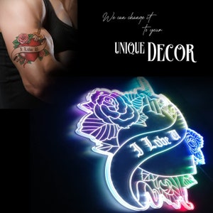 May include: A neon sign with a heart, roses, and a dagger. The sign is lit up in rainbow colors and says "I Love U".