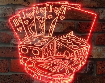 May include: Red neon sign depicting playing cards and dice. The cards are arranged in a fan shape with the ace of spades visible. The dice are stacked on top of each other with a chip in the centre.