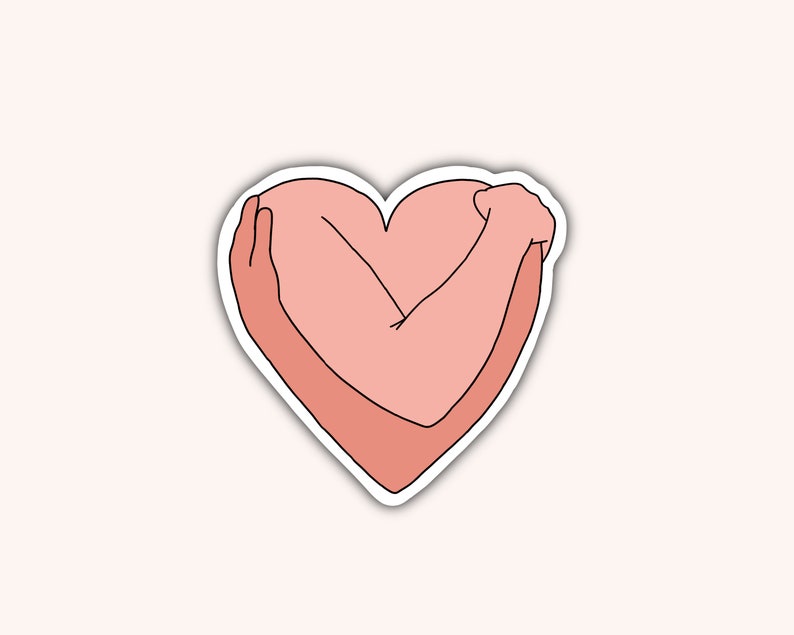 May include: A sticker featuring a heart shape formed by arms embracing themselves. The arms and heart are in shades of pink, outlined in black, and set against a light pink background. The design conveys self-love and care.