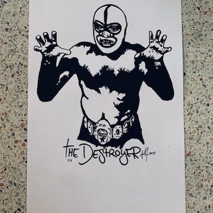 May include: Black and white illustration of a masked wrestler with a belt and the text "The Destroyer" in a stylized font.