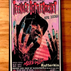 May include: A concert poster for Teenage Bottlerocket with a graphic of a horror movie character with syringes. The poster advertises a show on Saturday, June 26th at the Skate Park of Tampa. The poster also lists MakeWar and Rutterkin as special guests.