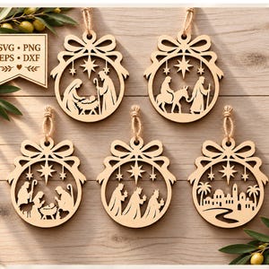 May include: Five circular light-colored wooden ornaments featuring laser-cut nativity scenes, each topped with a bow and hanging twine. A rectangular sign displays the text SVG, PNG, EPS, DXF. The designs include the holy family, the journey to Bethlehem, the three wise men, and a city landscape.