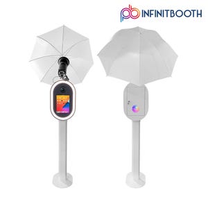 May include: White photo booth with a white umbrella and a screen displaying a colorful logo. The photo booth has a white stand and a white box on the side.