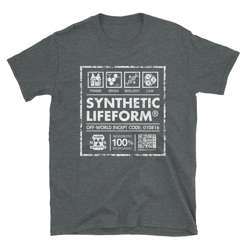 May include: A dark grey t-shirt with a white graphic design of a label that reads "Synthetic Lifeform&reg;" with the text "Off-World Incept Code: 010816" and a QR code.