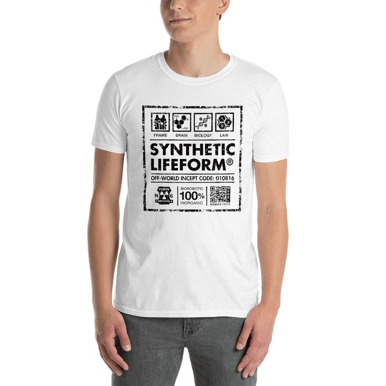 May include: White t-shirt featuring a black and white graphic of a label that reads "Synthetic Lifeform&reg;" with the text "Off-World Incept Code: 010816" and a QR code.