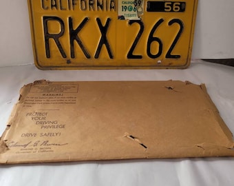 Vintage California License Plate comes with original envelope. Yellow and Black