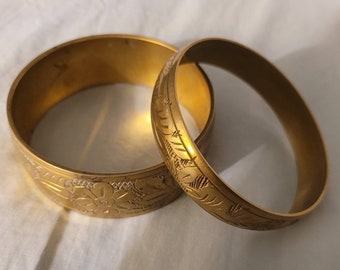 Set of two floral brass bangles