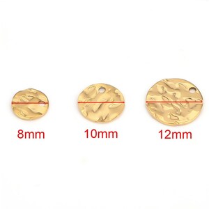 May include: Three gold-colored metal circle charms with a textured surface. The charms have a hole in the center and measure 8mm, 10mm, and 12mm in diameter.