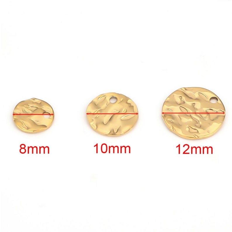 May include: Three gold-colored metal circle charms with a textured surface. The charms have a hole in the center and measure 8mm, 10mm, and 12mm in diameter.