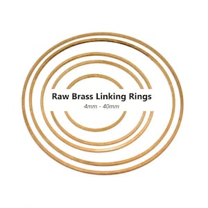 May include: A collection of raw brass linking rings in various sizes, ranging from 4mm to 40mm. The rings are arranged concentrically, showcasing their circular shape and golden color. Text on the image reads "Raw Brass Linking Rings 4mm - 40mm."