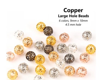May include: A collection of copper large hole beads in various colors, including gold, silver, rose gold, and black. The beads are 9mm x 10mm in size with a 4.5mm hole.