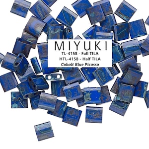 May include: A selection of cobalt blue Miyuki TILA beads, in full and half TILA styles. The beads have a Picasso finish, with square and rectangular shapes. The image includes the text "MIYUKI" and product codes.