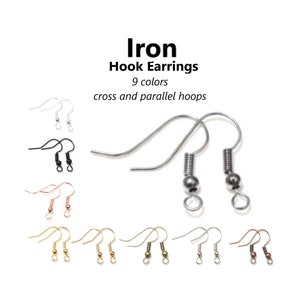 May include: Iron hook earrings in 9 colours, including silver, gold, black, and rose gold. The earrings have a cross and parallel hoop design.