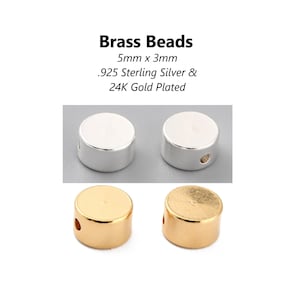 May include: Two silver and two gold round beads with a hole in the centre. The beads are 5mm x 3mm and are made of brass with a .925 sterling silver and 24K gold plated finish. Brass Beads.