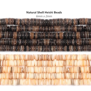 May include: Two strands of natural shell Heishi beads. The top strand is brown and the bottom strand is a light beige colour. The beads are 6mm x 2mm.