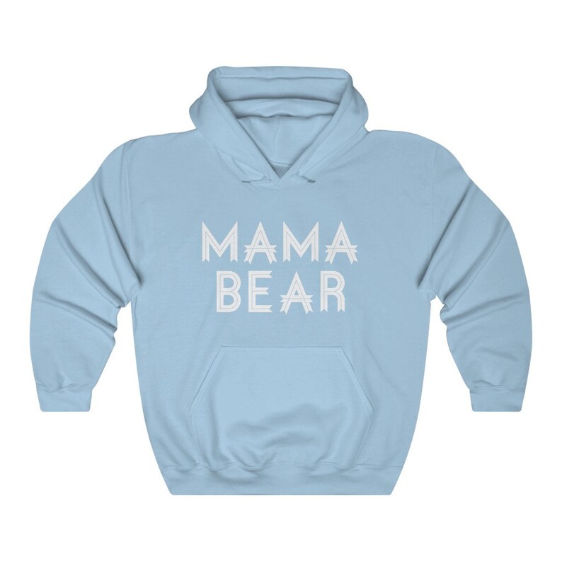 May include: A light blue hooded sweatshirt with the text "MAMA BEAR" printed in white on the front.