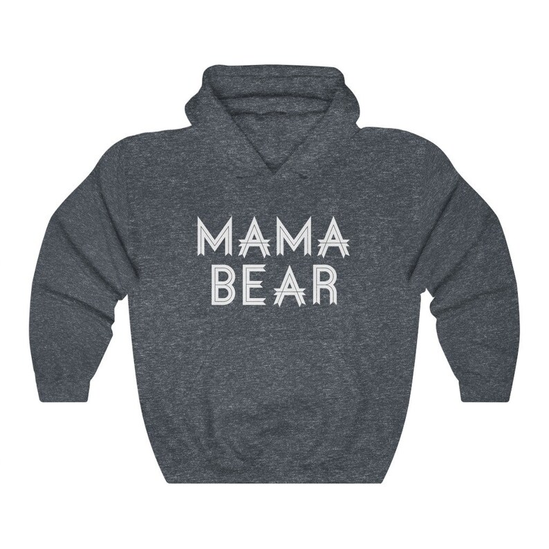 May include: A dark blue hooded sweatshirt with the text "MAMA BEAR" printed in white on the front.