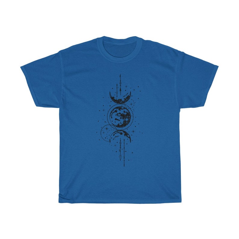 May include: A royal blue t-shirt featuring a black graphic of the phases of the moon. The design includes crescent moons, a full moon, and dotted lines. The shirt is made of a soft material.
