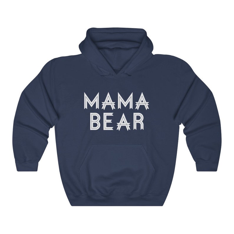 May include: A navy blue hooded sweatshirt with the text "MAMA BEAR" printed in white on the front.