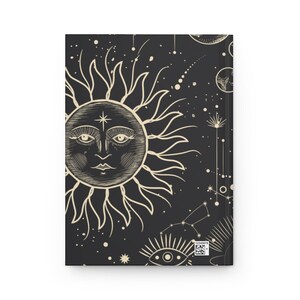 May include: A black and white illustration of a sun with a face and a star on its forehead. The sun is surrounded by stars and other celestial bodies. The background is black.