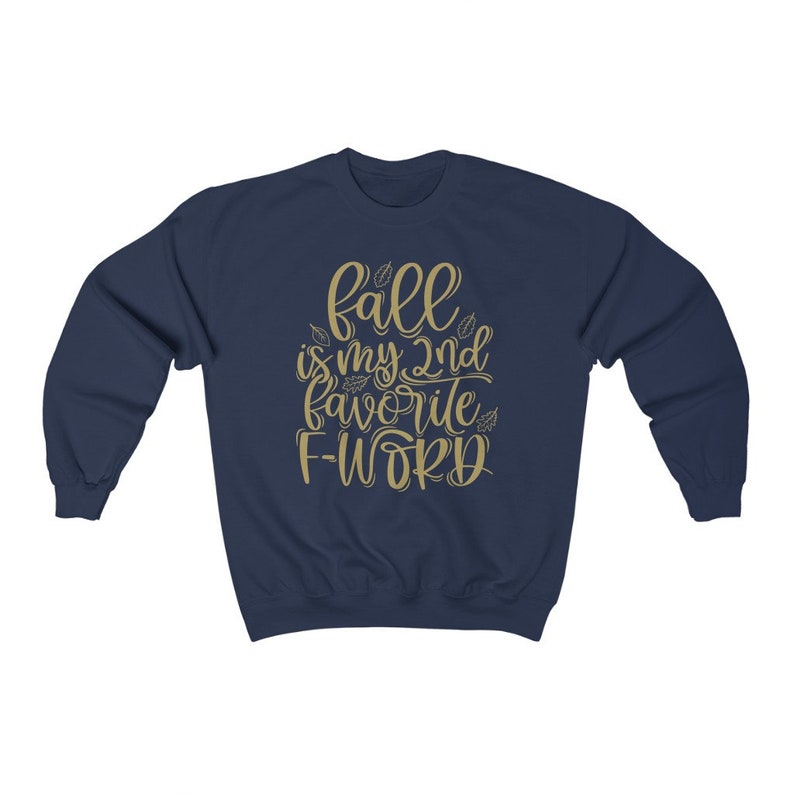May include: Navy blue sweatshirt with a gold graphic that says "Fall is my 2nd favorite F-word".