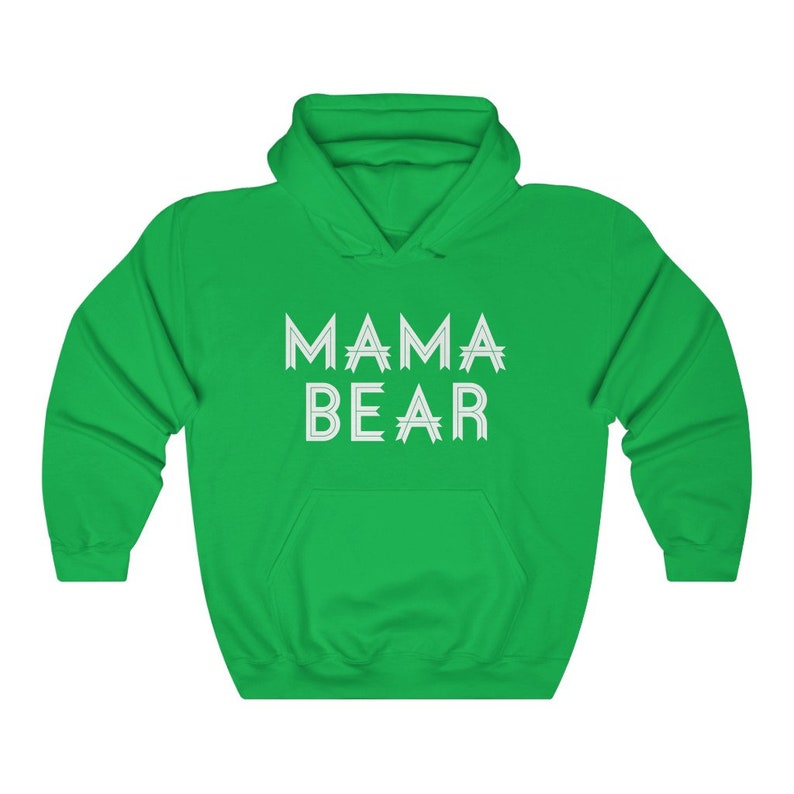May include: Green hooded sweatshirt with the text "MAMA BEAR" in white outlined letters.