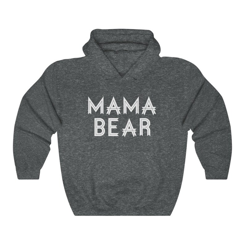 May include: A dark gray hooded sweatshirt with the text "MAMA BEAR" printed in white on the front.