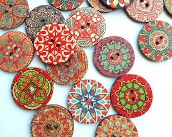 May include: Assortment of colorful wooden buttons with intricate mandala designs. The buttons are round and have two holes. The colors include red, orange, yellow, green, blue, and purple.