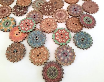 May include: Assortment of colorful wooden buttons with intricate mandala designs. The buttons are round and have a scalloped edge. They are perfect for adding a touch of bohemian style to your crafts.