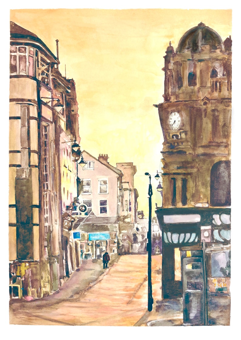 May include: A watercolor painting of a street scene in a city. The buildings are old and have a lot of character. The street is empty except for one person walking down the middle. The sky is a light yellow color.