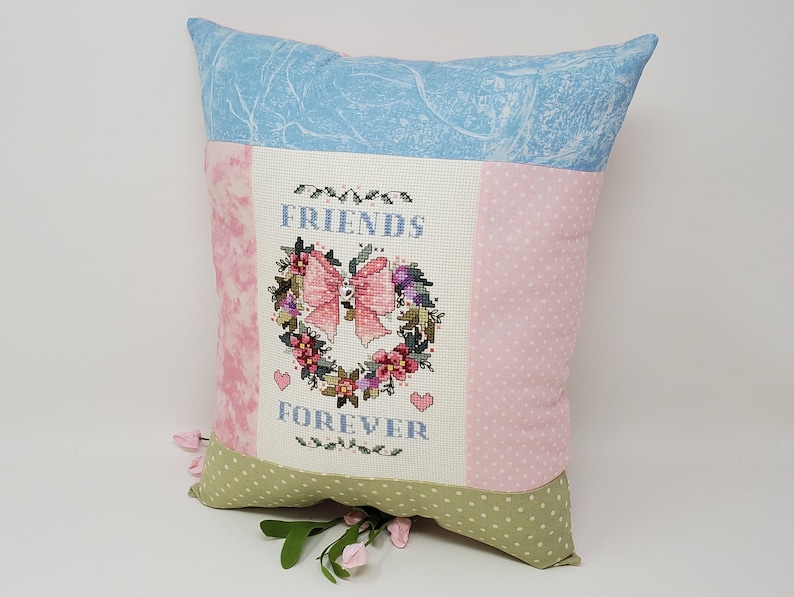 Finished Cross-Stitched FRIENDS FOREVER ANGEL Pillow on 14 count white aida with Silver Heart Charm