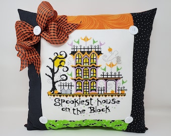 Finished Cross-Stitched SPOOKIEST HOUSE on the BLOCK extra-large Pillow on 14 count white aida with Haunted House Charm, Shell Buttons & Bow