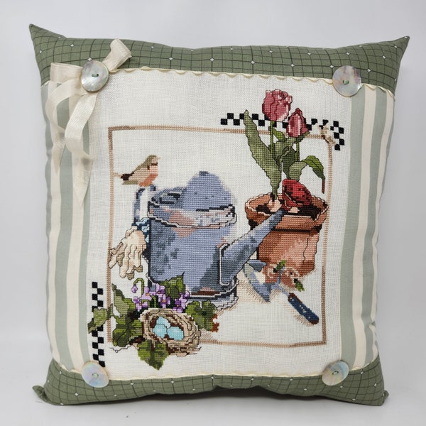 Marjolein Bastin cross-stitched GARDEN LIFE PILLOW on 36 count Vanilla Linen with Shell Buttons, Rickrack & French Ribbon 16 x 16 inches