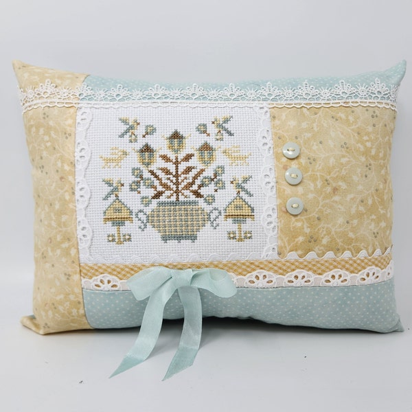 Anabella's cross-stitched SPRING BOUQUET #2 PILLOW on 14 count White Aida with Pearls, Rickrack, Eyelet, Buttons & Ribbon 13 x 9 inches