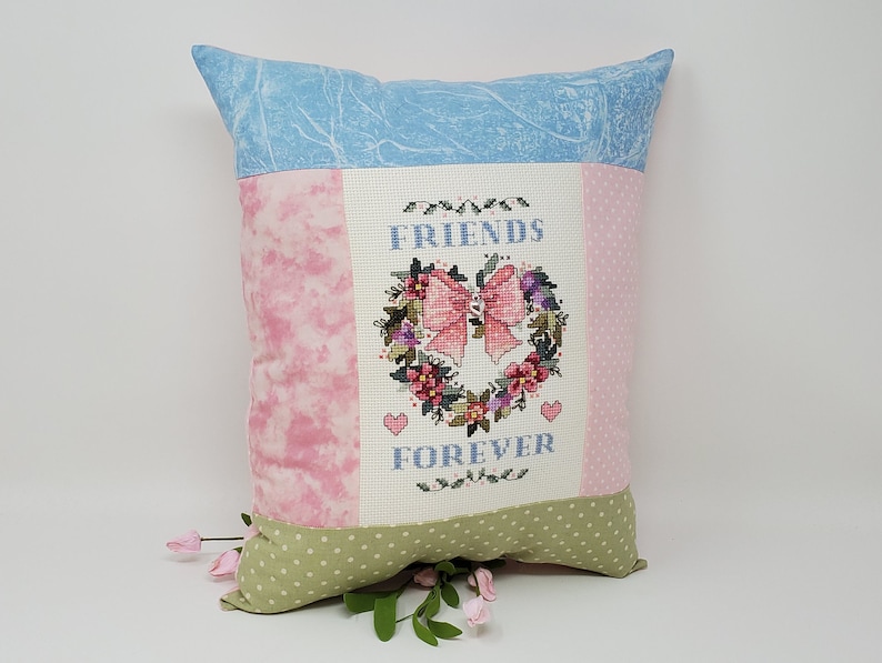 Finished Cross-Stitched FRIENDS FOREVER ANGEL Pillow on 14 count white aida with Silver Heart Charm