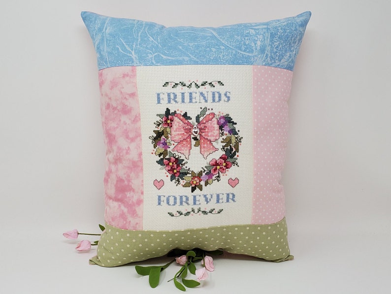 Finished Cross-Stitched FRIENDS FOREVER ANGEL Pillow on 14 count white aida with Silver Heart Charm