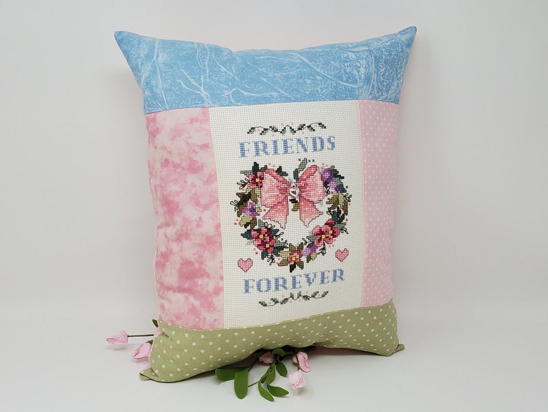 Finished Cross-Stitched FRIENDS FOREVER ANGEL Pillow on 14 count white aida with Silver Heart Charm