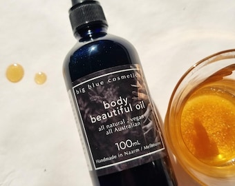 Aceite corporal brillante: Macadamia, oliva y quandong - Mica dorada (botella de vidrio azul de 100 ml)
