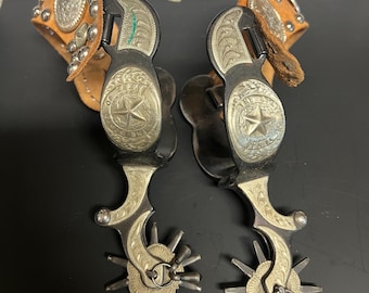 Vintage Cowboy Pair Spurs with Tooled Leather Straps and Silver Conchos