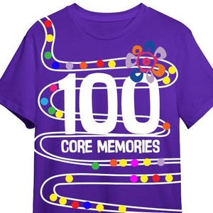 May include: A purple t-shirt featuring the text "100 CORE MEMORIES" in white. The design includes a white winding path with colourful dots and a flower graphic. The back of the shirt has a similar design.