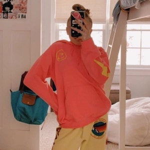 neon smiley face lightning bolt hoodie