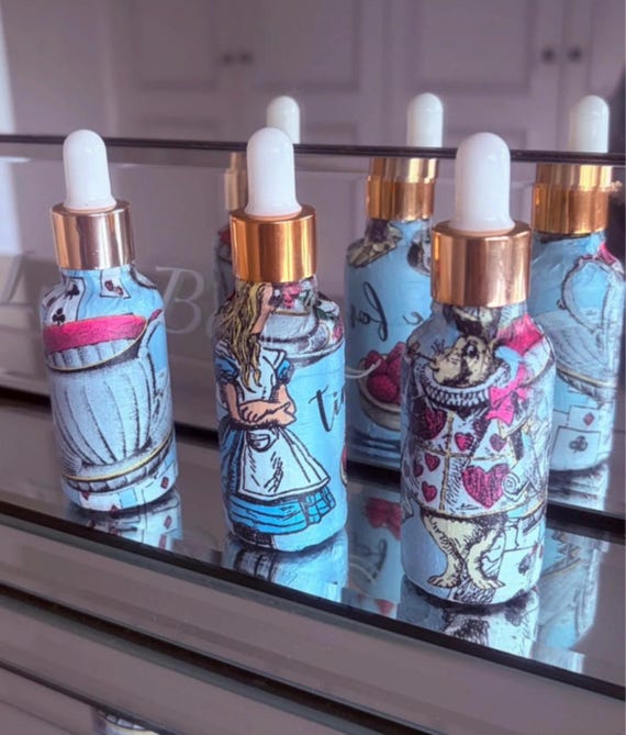 Alice in Wonderland handcrafted Glass Dropper Bottles Apothecary Glass Set of 3